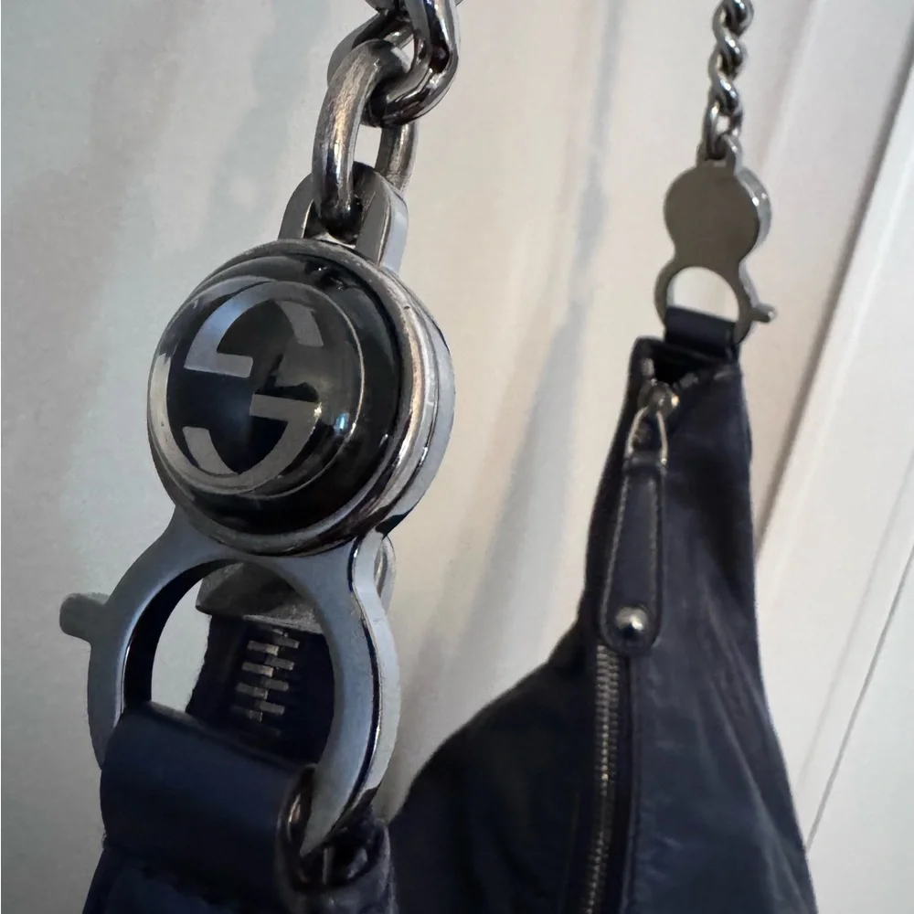 Gucci Metallic Leather Galaxy Chain Hobo
Size: 14.50" (L) x 5.00" (W) x 10 - Picture 12 of 16